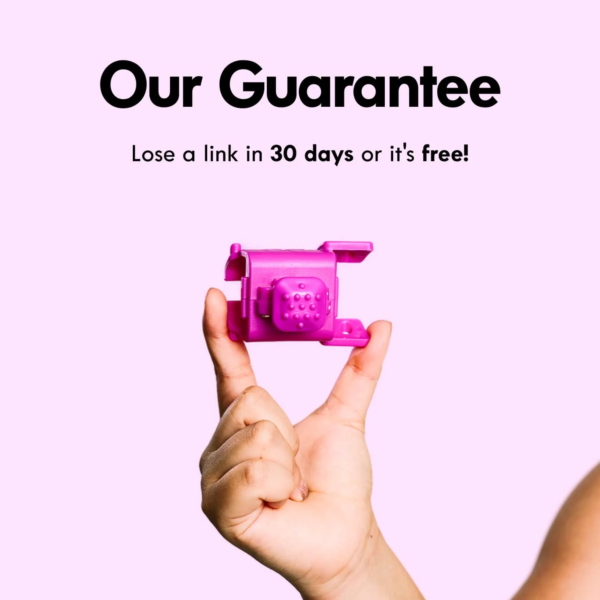 Hand holding a pink fitness hoop part with "Our Guarantee" text